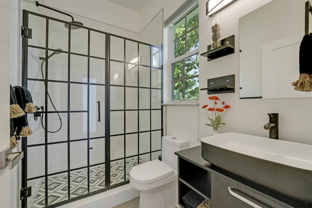 127 Via Castilla, Jupiter, FL 33458 - full bathroom featuring a stall shower, toilet, and vanity