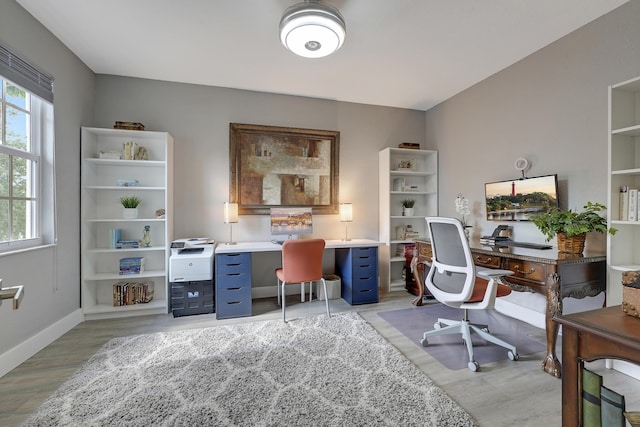 127 Via Castilla, Jupiter, FL 33458 - office space with light wood-style floors and baseboards