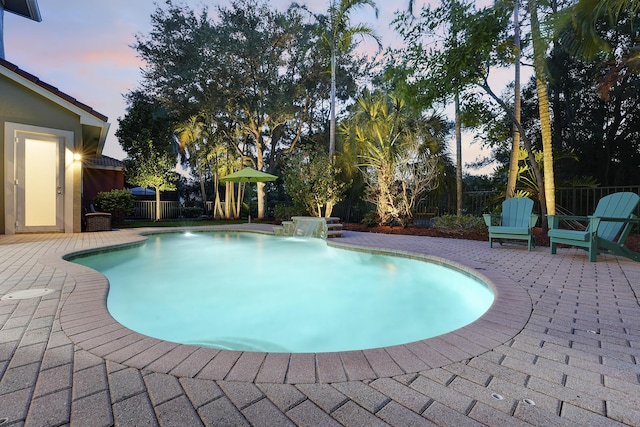 127 Via Castilla, Jupiter, FL 33458 - view of pool featuring a patio area and a fenced backyard