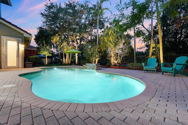 127 Via Castilla, Jupiter, FL 33458 - view of swimming pool featuring a patio and a fenced backyard
