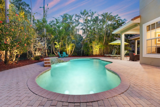 127 Via Castilla, Jupiter, FL 33458 - view of pool with a patio and a fenced backyard