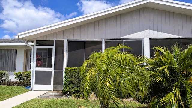 3477 Christopher St Unit 3477, West Palm Beach, FL 33417 - view of home's exterior with a sunroom