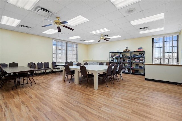 3477 Christopher St Unit 3477, West Palm Beach, FL 33417 - dining area featuring ceiling fan, light wood-type flooring, and a paneled ceiling