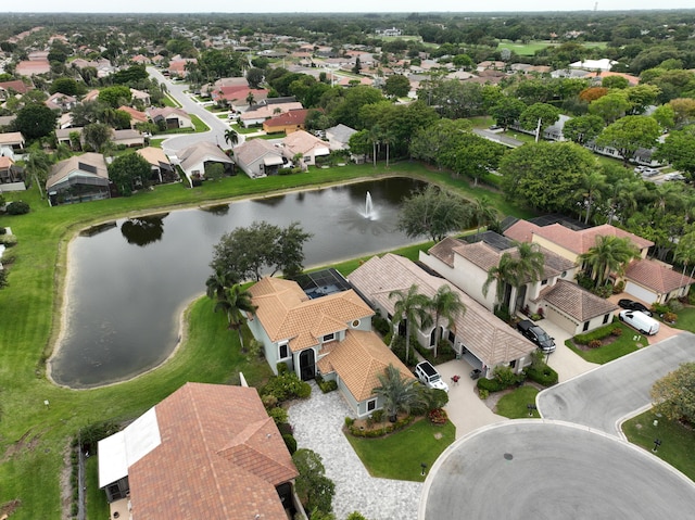 aerial overview of property's location featuring a large body of water and nearby suburban area