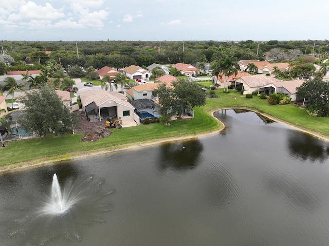 aerial perspective of suburban area with a large body of water