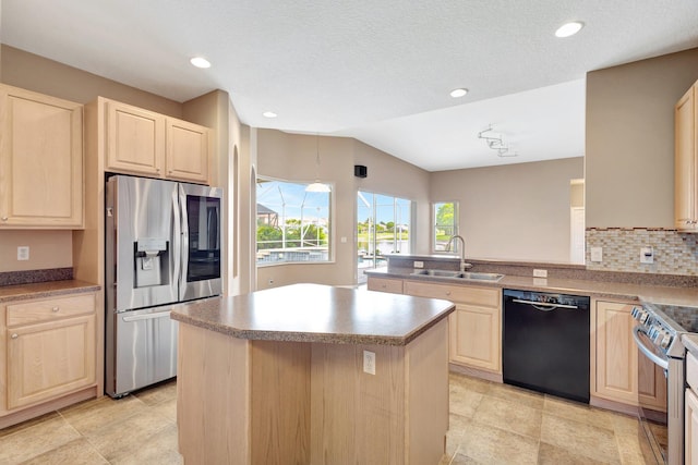 3588 Turtle Island Ct, West Palm Beach, FL 33411 - kitchen featuring stainless steel appliances, a sink, light brown cabinets, vaulted ceiling, and a center island
