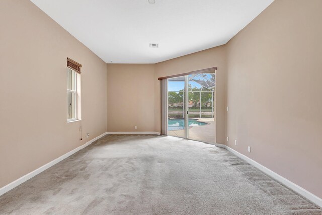 3588 Turtle Island Ct, West Palm Beach, FL 33411 - carpeted empty room featuring baseboards
