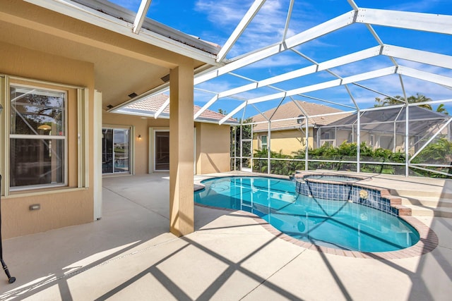 3588 Turtle Island Ct, West Palm Beach, FL 33411 - view of swimming pool featuring a patio, a pool with connected hot tub, and a lanai