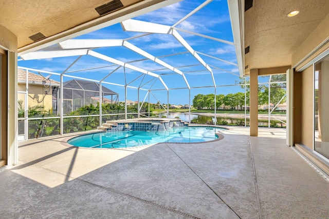 3588 Turtle Island Ct, West Palm Beach, FL 33411 - view of pool with a patio area, a water view, a pool with connected hot tub, and glass enclosure