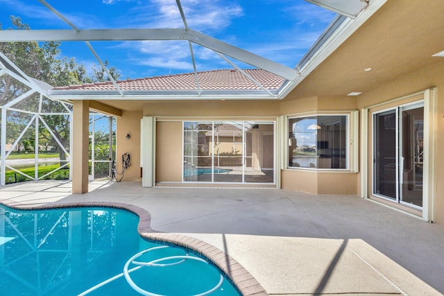 3588 Turtle Island Ct, West Palm Beach, FL 33411 - swimming pool with a patio area and a lanai
