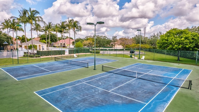 3588 Turtle Island Ct, West Palm Beach, FL 33411 - view of tennis court featuring fence