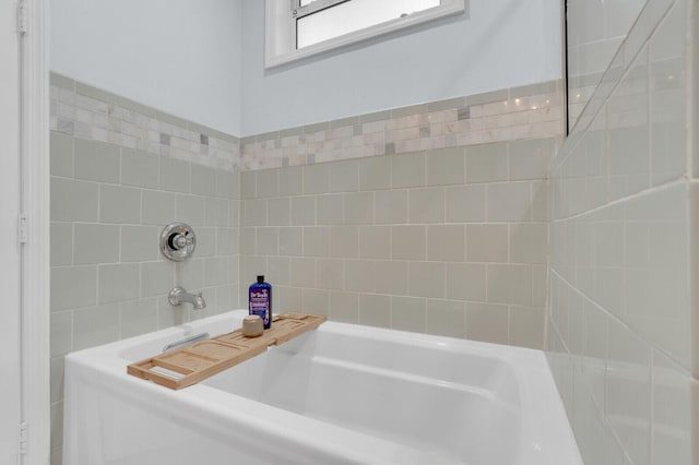 765 Lagoon Dr, North Palm Beach, FL 33408 - bathroom featuring a tub to relax in