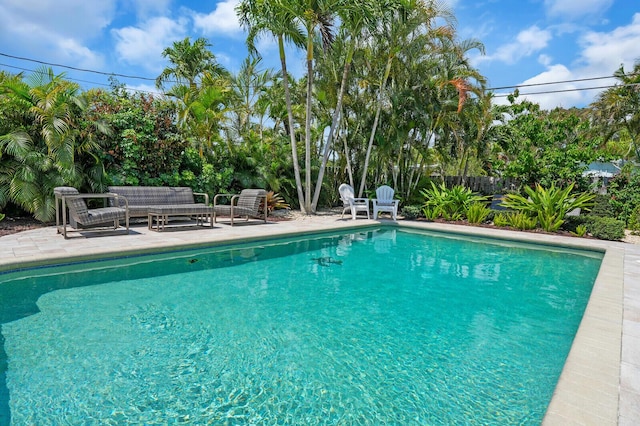 765 Lagoon Dr, North Palm Beach, FL 33408 - view of pool with a patio area and outdoor lounge area