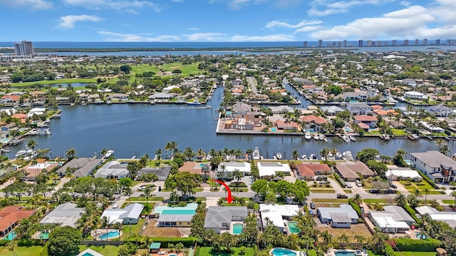 765 Lagoon Dr, North Palm Beach, FL 33408 - aerial view of residential area featuring a nearby body of water