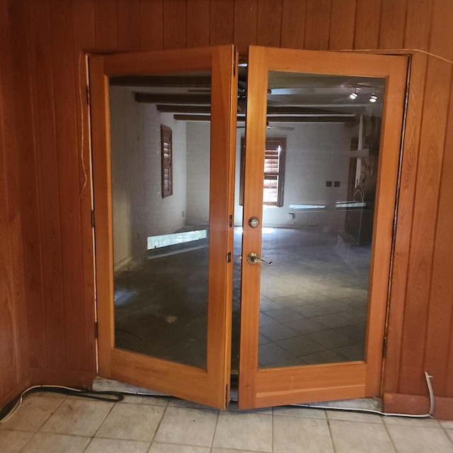 16761 130th Way N, Jupiter, FL 33478 - hallway featuring wood walls and tile patterned floors