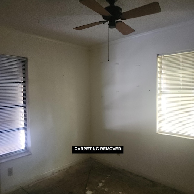 16761 130th Way N, Jupiter, FL 33478 - tiled empty room with ceiling fan and crown molding
