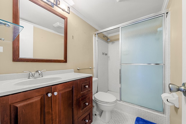 bathroom featuring crown molding, tile patterned floors, toilet, a stall shower, and vanity