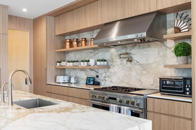 160 Periwinkle Dr, Hypoluxo, FL 33462 - kitchen with wall chimney exhaust hood, open shelves, range with two ovens, and modern cabinets