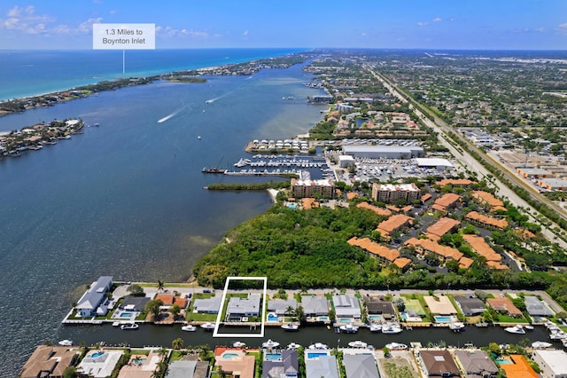 160 Periwinkle Dr, Hypoluxo, FL 33462 - aerial view of property's location featuring a large body of water and property parcel outlined