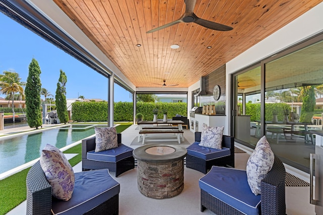 160 Periwinkle Dr, Hypoluxo, FL 33462 - view of patio / terrace with an outdoor living space with a fire pit, a ceiling fan, and an outdoor pool