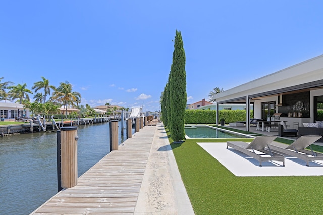 160 Periwinkle Dr, Hypoluxo, FL 33462 - dock area with a water view and a patio area
