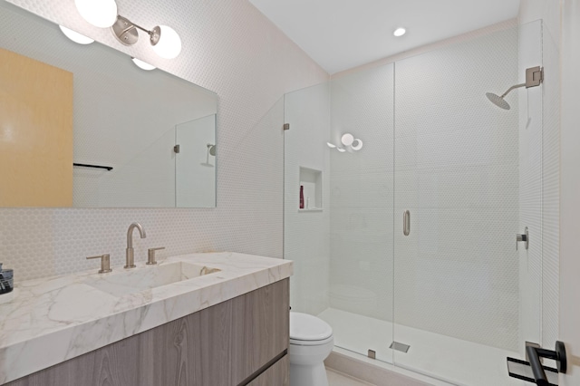 160 Periwinkle Dr, Hypoluxo, FL 33462 - bathroom featuring a shower stall, toilet, vanity, recessed lighting, and tasteful backsplash