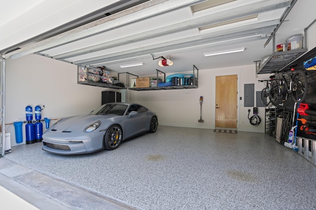 160 Periwinkle Dr, Hypoluxo, FL 33462 - garage with electric panel and a garage door opener