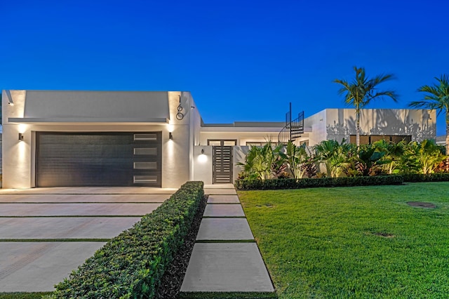 160 Periwinkle Dr, Hypoluxo, FL 33462 - contemporary house featuring a garage, stucco siding, and driveway
