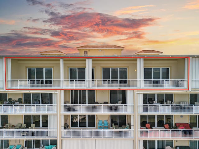 view of property at dusk
