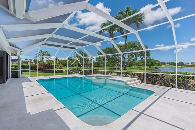 17726 Litten Dr, Boca Raton, FL 33498 - view of pool with a patio area, a water view, a lanai, and a pool with connected hot tub