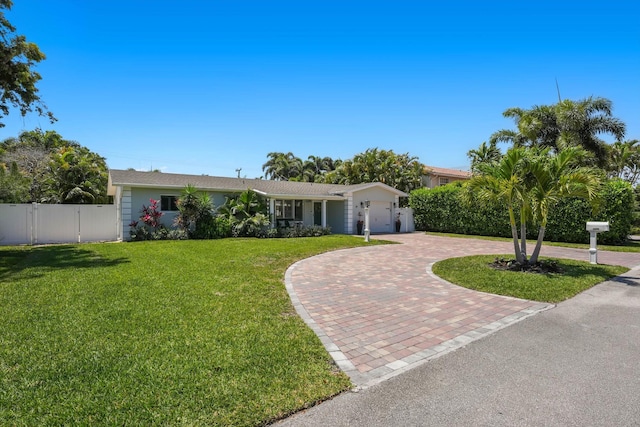 1096 SW 16th St, Boca Raton, FL 33486 - ranch-style house featuring curved driveway and a garage