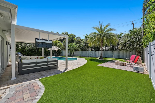 1096 SW 16th St, Boca Raton, FL 33486 - view of yard with an outdoor living space with a fire pit and a patio area