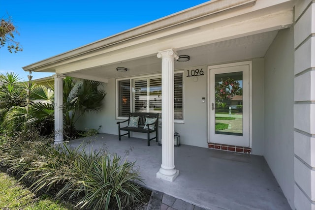 1096 SW 16th St, Boca Raton, FL 33486 - entrance to property with a porch