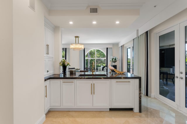 400 S Ocean Blvd Unit R25, Boca Raton, FL 33432 - kitchen with a sink, dark countertops, a peninsula, white cabinetry, and recessed lighting