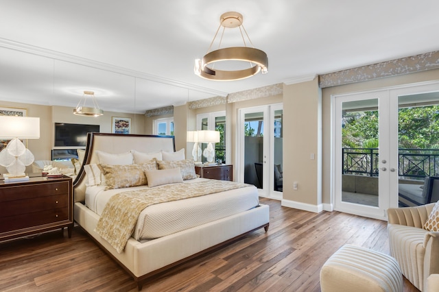 400 S Ocean Blvd Unit R25, Boca Raton, FL 33432 - bedroom featuring french doors, multiple windows, wood finished floors, and access to outside