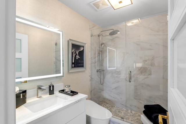 400 S Ocean Blvd Unit R25, Boca Raton, FL 33432 - bathroom with a marble finish shower, vanity, and toilet