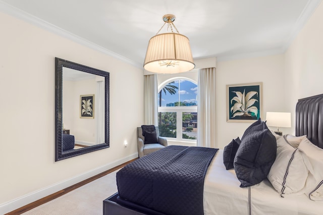 400 S Ocean Blvd Unit R25, Boca Raton, FL 33432 - bedroom with wood finished floors, crown molding, and baseboards