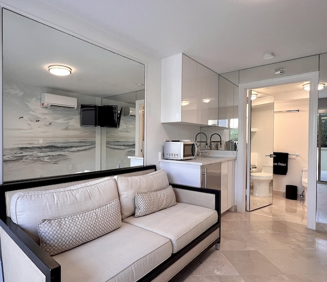 400 S Ocean Blvd Unit R25, Boca Raton, FL 33432 - living room with a wall unit AC and light marble finish floors