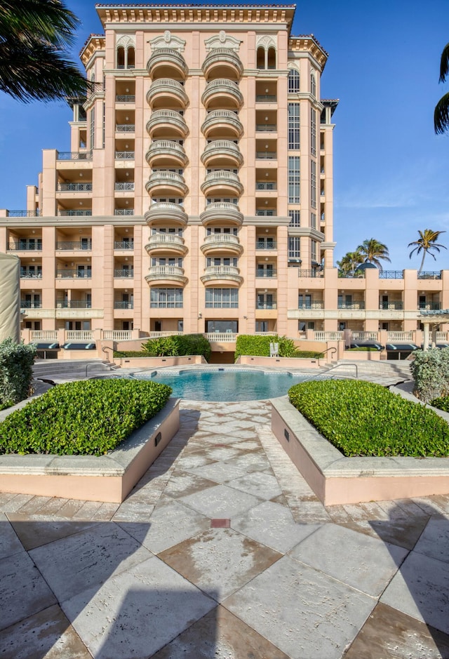 400 S Ocean Blvd Unit R25, Boca Raton, FL 33432 - view of apartment building / complex with a community pool