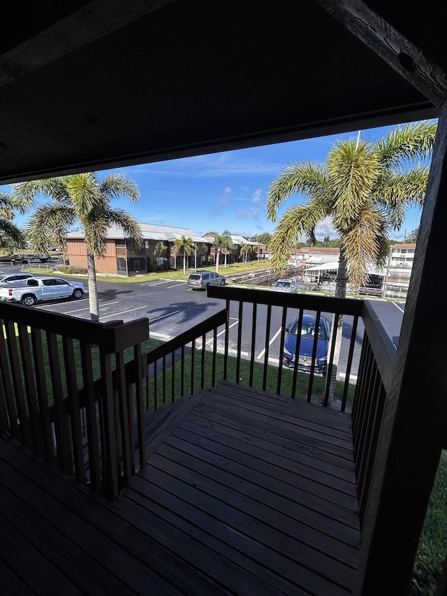 500 N Francisco St Unit 211, Clewiston, FL 33440 - wooden deck with a residential view
