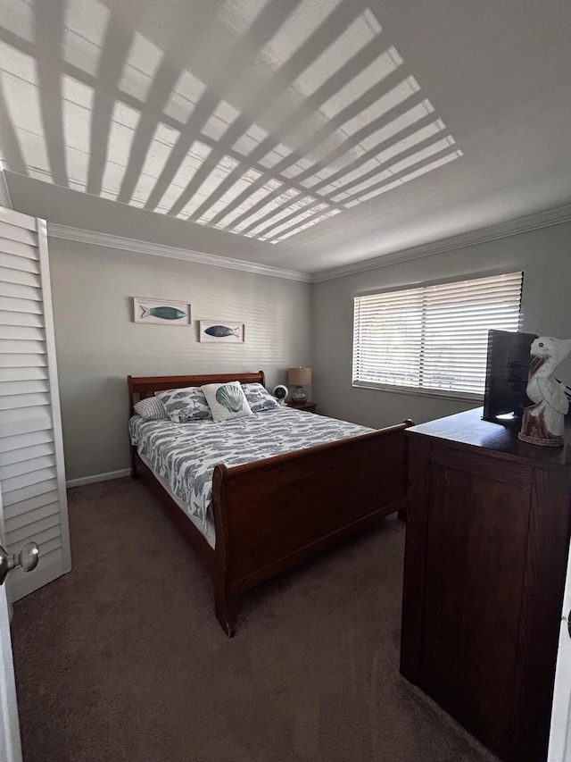 500 N Francisco St Unit 211, Clewiston, FL 33440 - carpeted bedroom with crown molding and baseboards