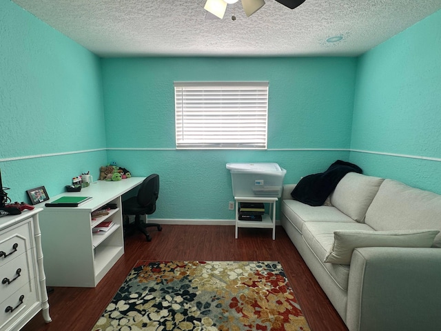 442 Griswold Dr, Lake Worth Beach, FL 33461 - office area featuring a textured wall, a textured ceiling, dark wood finished floors, a ceiling fan, and baseboards