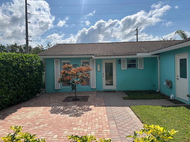 442 Griswold Dr, Lake Worth Beach, FL 33461 - view of front of house with stucco siding