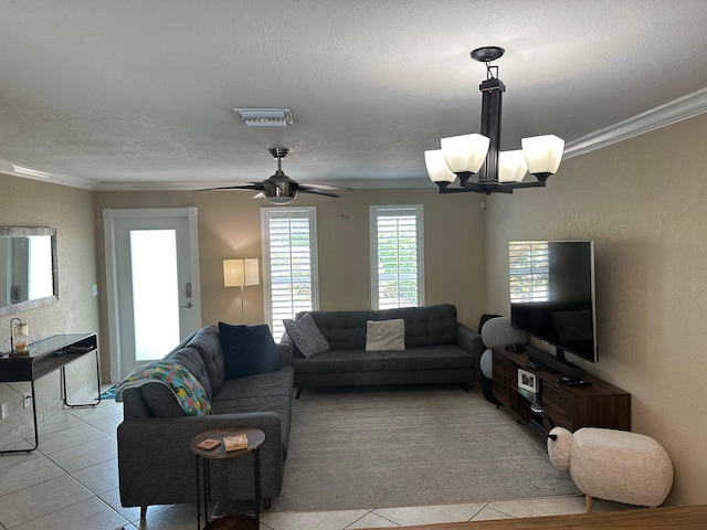 442 Griswold Dr, Lake Worth Beach, FL 33461 - living area with a chandelier, light tile patterned floors, crown molding, a textured wall, and a textured ceiling