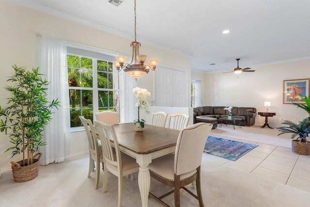 dining room featuring a chandelier, crown molding, ceiling fan, recessed lighting, and light carpet