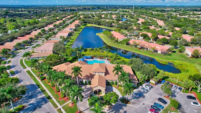aerial perspective of suburban area featuring a nearby body of water