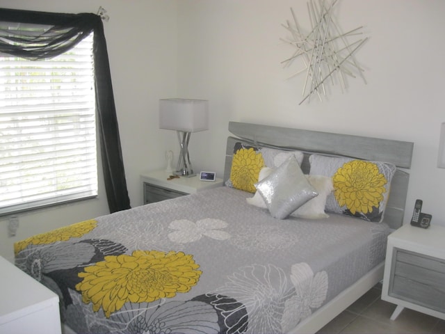 bedroom with tile patterned flooring