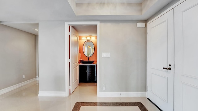 4740 S Ocean Blvd Unit 710, Highland Beach, FL 33487 - hallway with baseboards and light tile patterned flooring