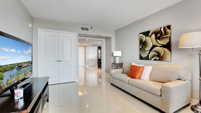 4740 S Ocean Blvd Unit 710, Highland Beach, FL 33487 - living area featuring baseboards