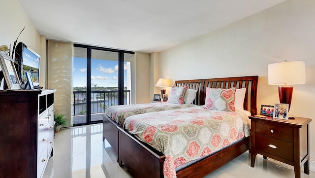 4740 S Ocean Blvd Unit 710, Highland Beach, FL 33487 - bedroom with floor to ceiling windows, access to outside, and light tile patterned flooring